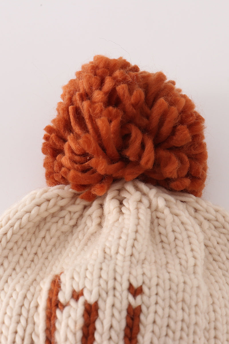 Beige pompom hi cable beanie hat