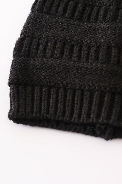 Black pompom cable beanie hat