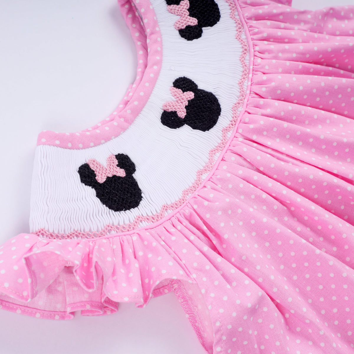 Pink character hand smocked dot ruffle bloomer set